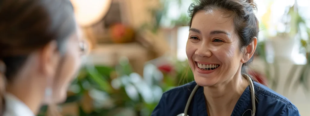 a health practitioner smiling with a patient during a therapy session.