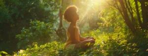 a person sitting peacefully in nature, eyes closed, surrounded by vibrant greenery and sunlight, while practicing the heartmath coherence technique.