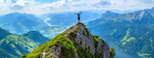 a person standing confidently on top of a mountain peak, arms outstretched, with a breathtaking view below.