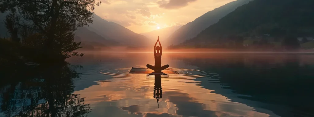 a serene lakeside sunrise with a lone figure practicing yoga to promote mindfulness and mental well-being.