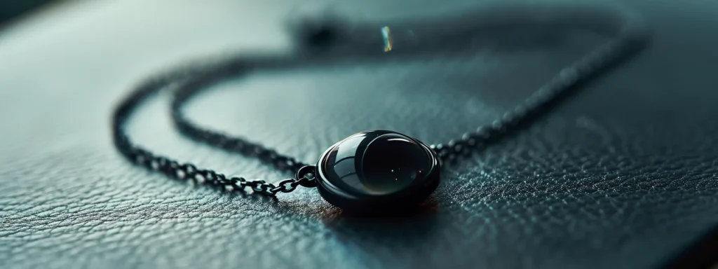 a sleek black cats eye necklace shimmering under soft lighting, perfect for a sophisticated evening out.