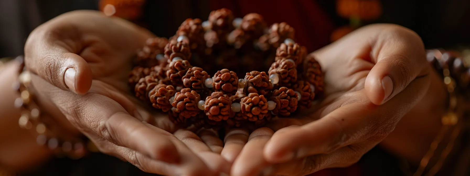 a person carefully placing a four mukhi rudraksha necklace around their neck, ensuring it sits perfectly centered for maximum effectiveness.