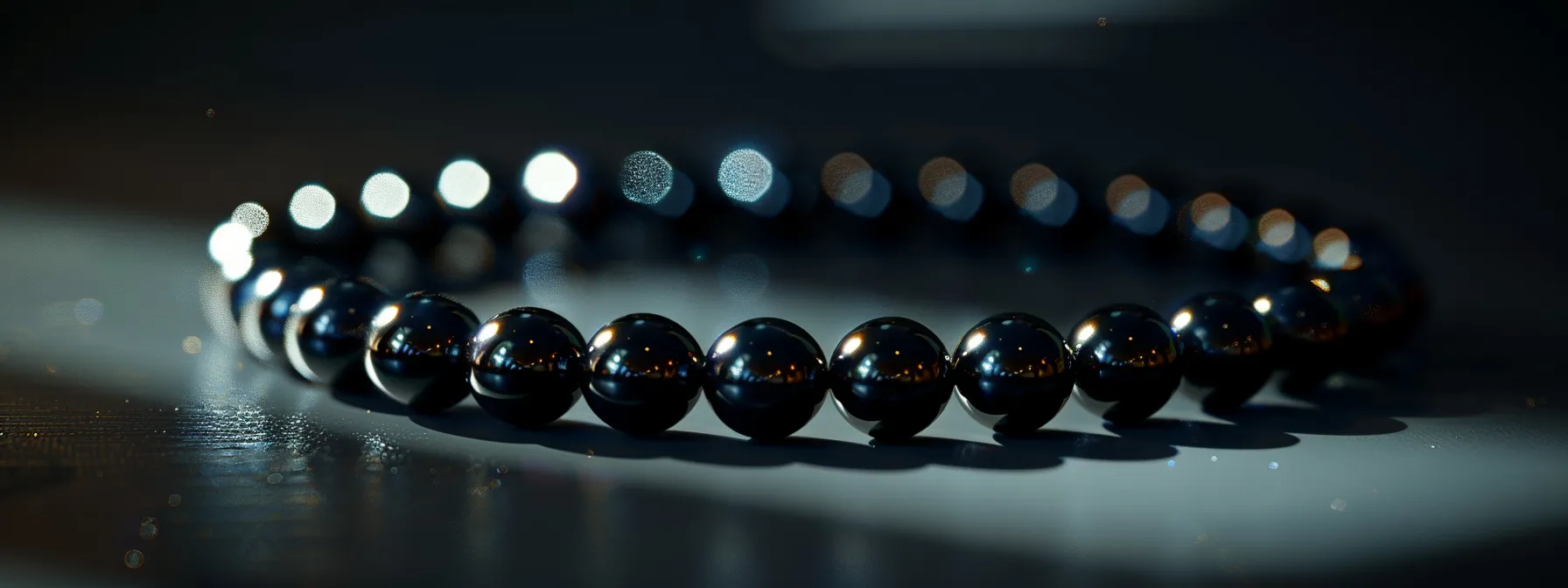 a stunning black onyx bracelet illuminated under a spotlight, symbolizing strength and confidence.